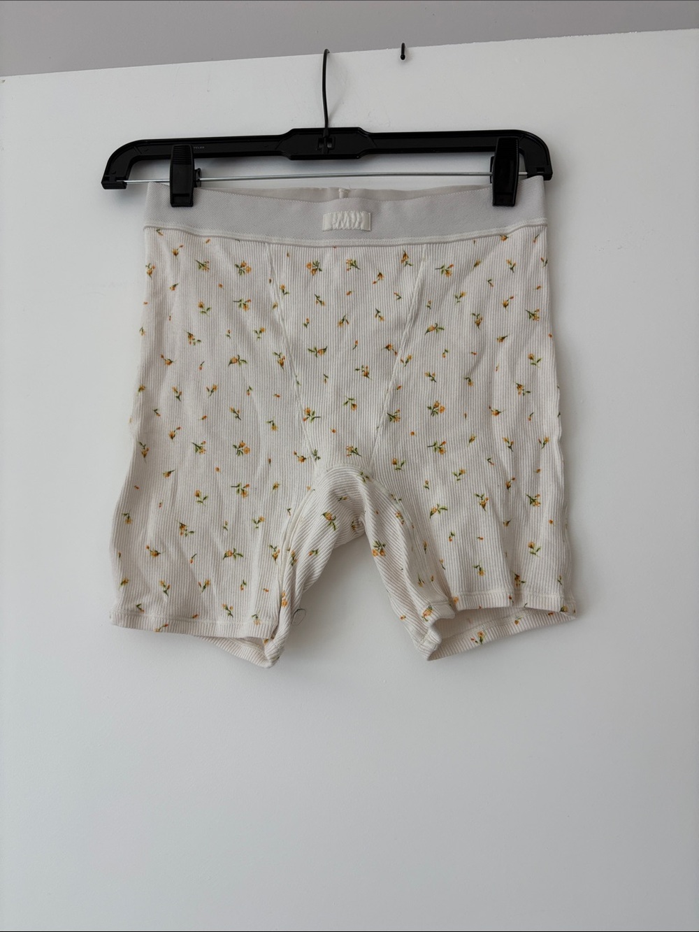 SKIMS Cream Ribbed Bike Shorts with Yellow Floral Print